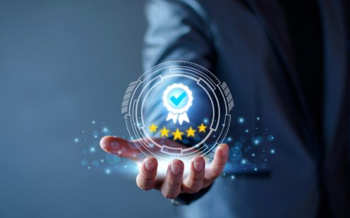 Quality Assurance Concept. Business people show high quality assurance mark, good service, premium, five stars, premium service assurance, excellence service, high quality, business excellence.